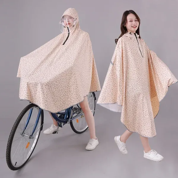 poncho vélo pluie orange pâle tacheté